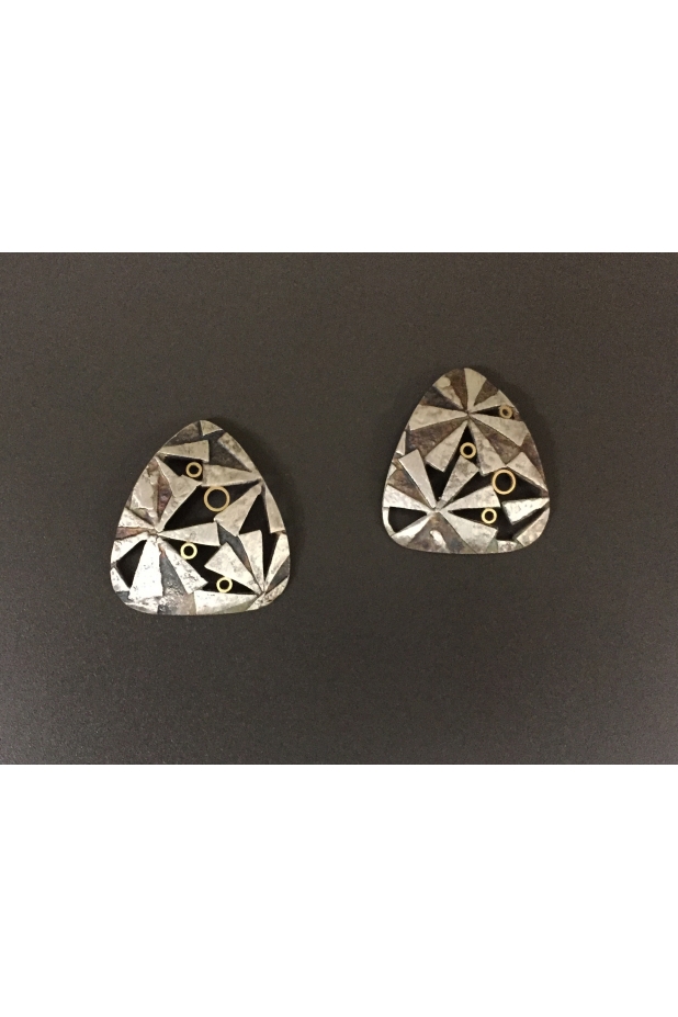 Sterling silver, 14k gold, patina.