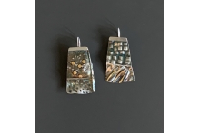 Earrings. Sterling silver, 22k gold, patina.