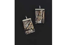 Earrings Textured sterling silver, 22k gold, patina.