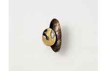 Silver and gold ring with patina.